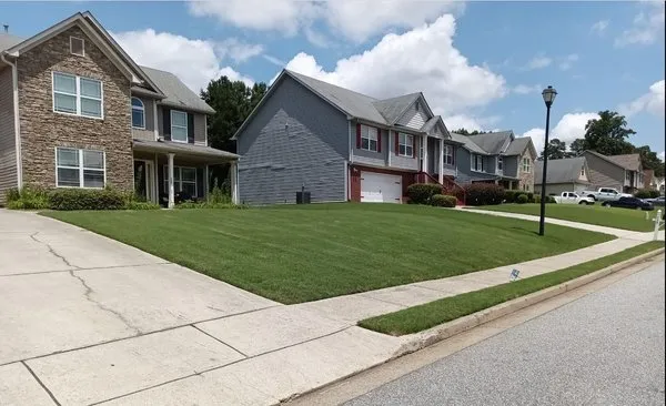 Smitty's Lawn Care Logo