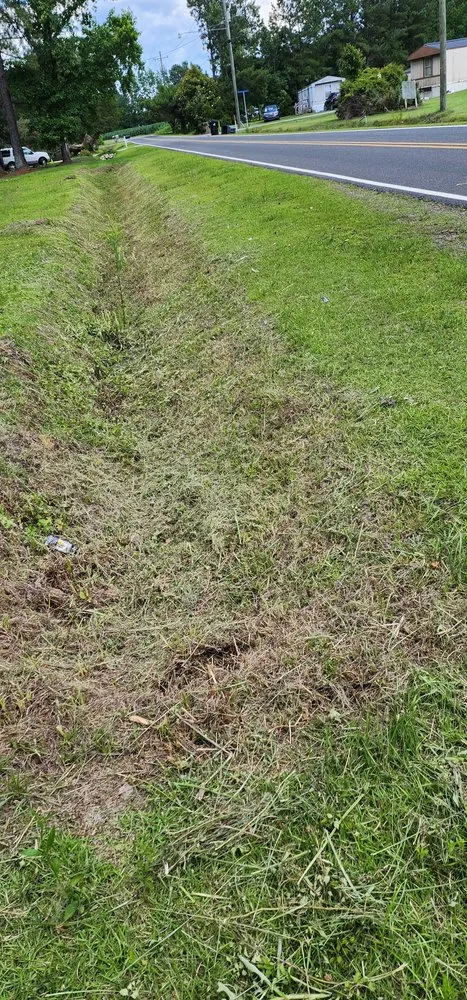 Affordable lawn mowing service near you across Bolivia, NC - Smittys Property Management