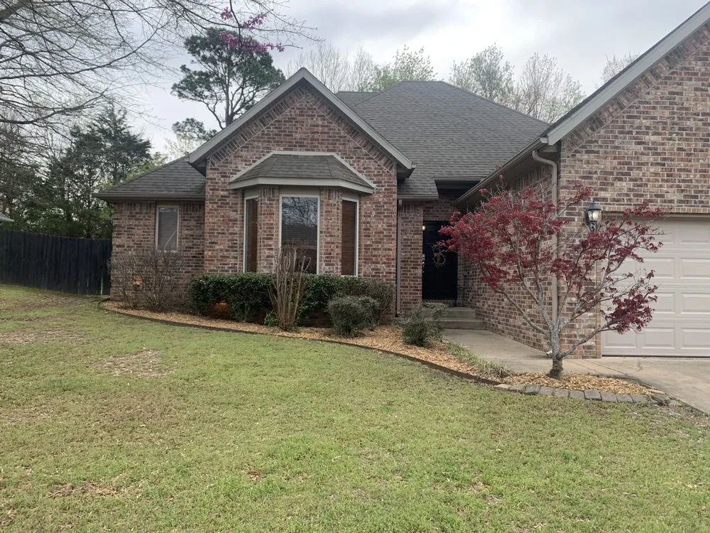 Professional yard cleanup service for homes across Elkins, AR - Smokin’ Aces Lawn Care