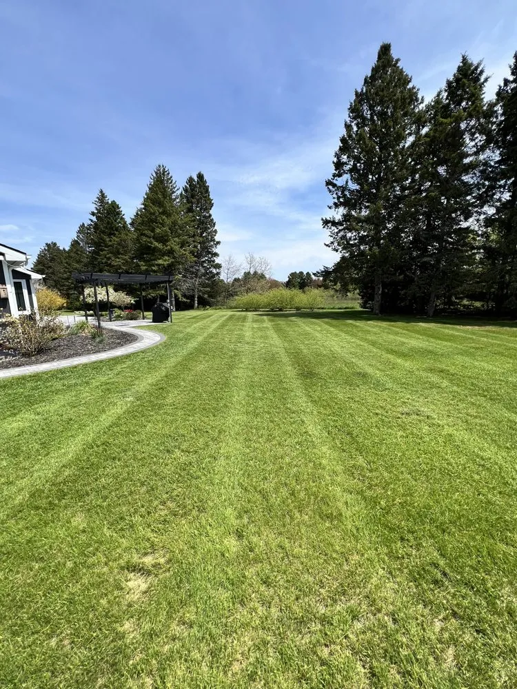 Affordable outdoor landscaping in Alabaster Township, MI by Smoking Grass Lawncare