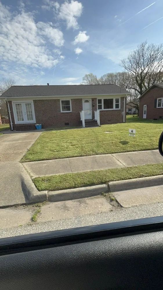 Affordable lawn mowing service in Chesapeake, VA by Snookumz Lawn Care