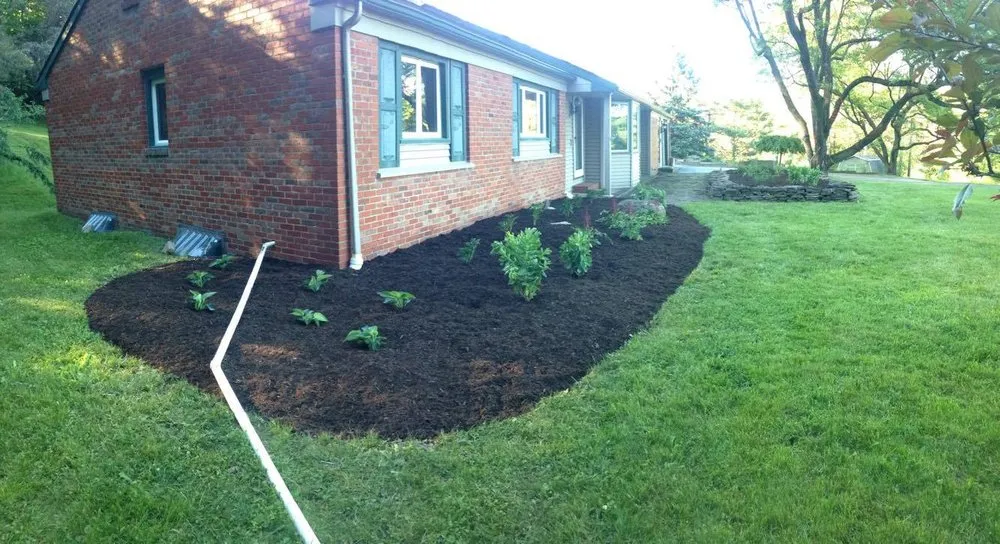 Custom residential landscaping with custom design in Alfred Station, NY by Snow Hill