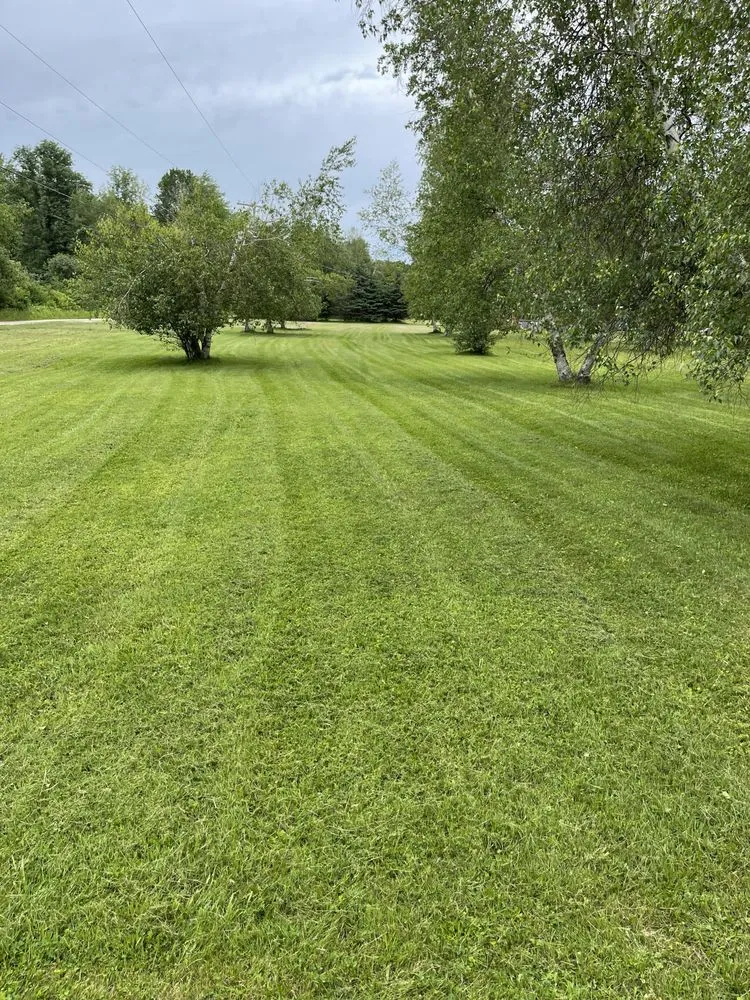 Custom landscape installation with custom design across Potsdam, NY - Snyders property maintenance