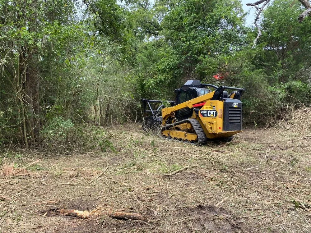 Custom lawn care service with custom design in Tomball, TX by So-Tex Underbrush Solutions
