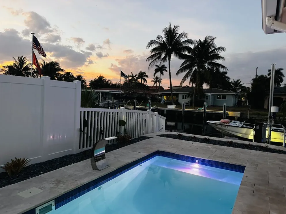 Expert lawn mowing service for outdoor upgrades in Pompano Beach, FL by SoFlo Landscape & Design