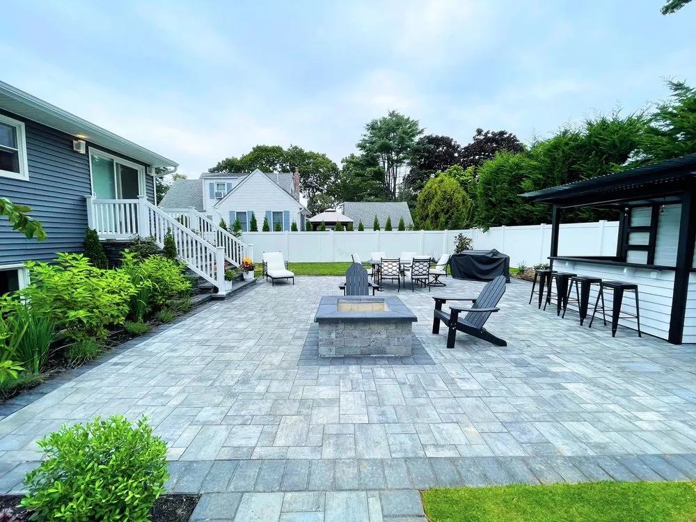 Custom landscape installation with custom design in East Islip, NY by Softwind Landscape & Masonry - NY