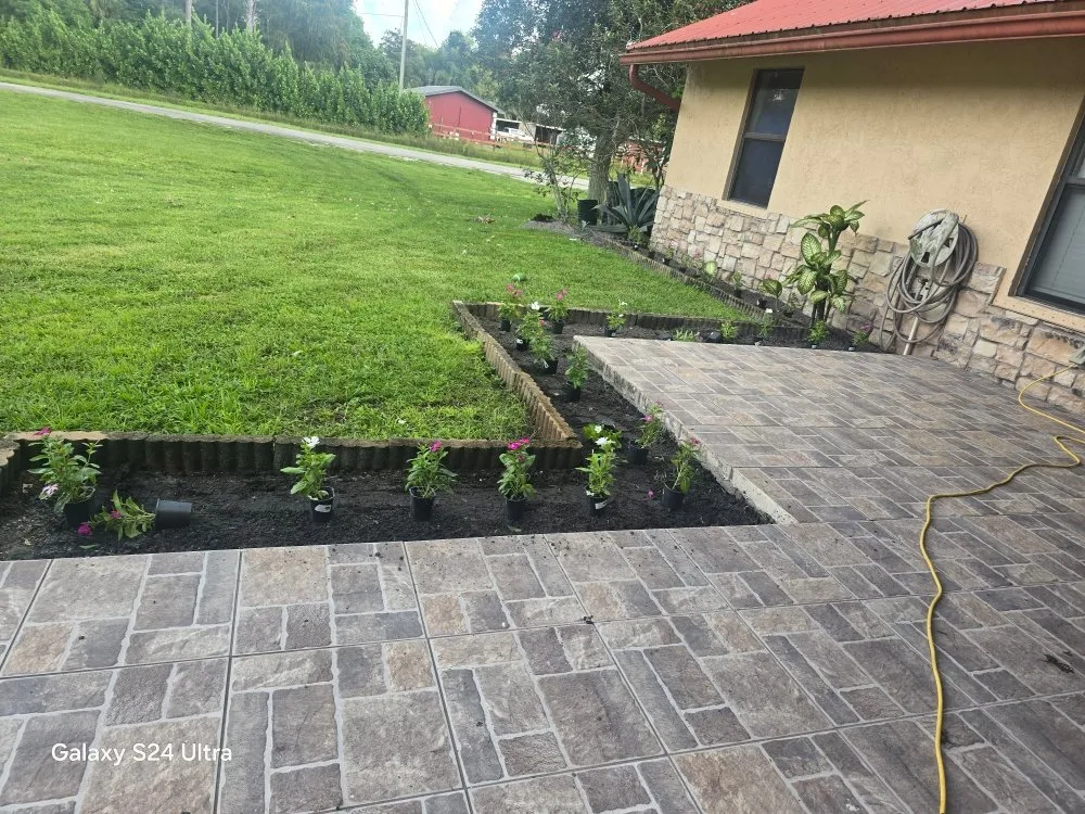 Professional yard maintenance for year-round maintenance in Loxahatchee, FL by Sol Landscaping Services