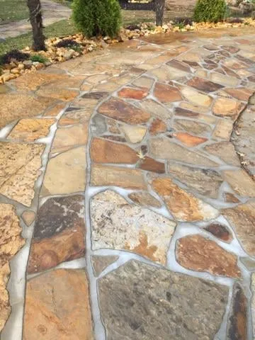 Local lawn care service for year-round maintenance in Little Rock, AR by Solid As A Rock