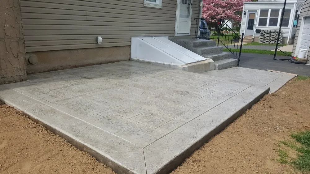 Expert yard cleanup service for residential properties in Trenton, NJ by Solid Gold Construction