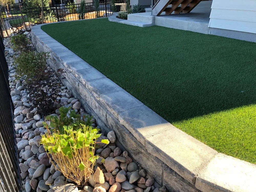 Reliable lawn care service with custom design in Littleton, CO by Solid Rock Landscape