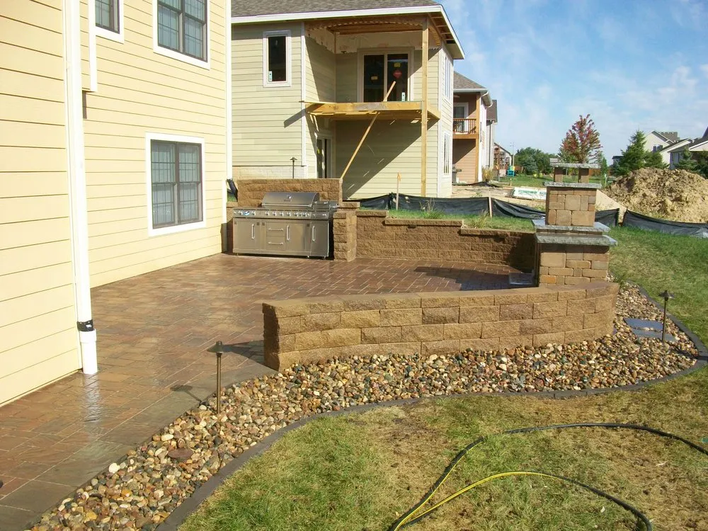 Custom landscape design in West Des Moines, IA by Solid Rock Landscaping