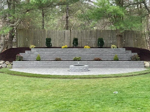 Custom lawn care service for year-round maintenance in Marlborough, MA by Solution Driven Landscaping