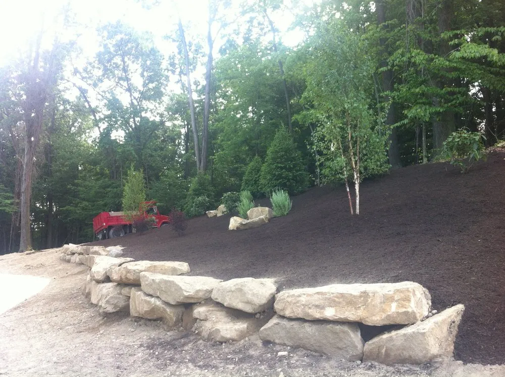 Reliable lawn mowing service for residential properties in Gibsonia, PA by Solutions Landscapes & Designs, LLC