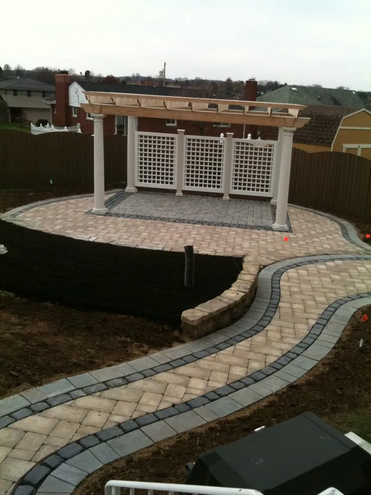 Expert landscape installation for year-round maintenance in Gibsonia, PA by Solutions Landscapes & Designs, LLC