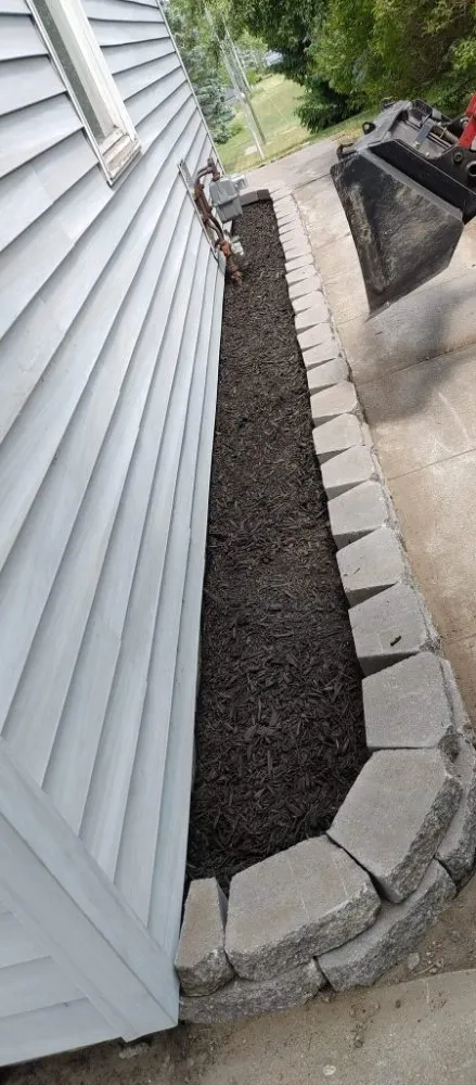 Professional lawn mowing service in Ithaca, MI by Son's & Brother Land Maintenance