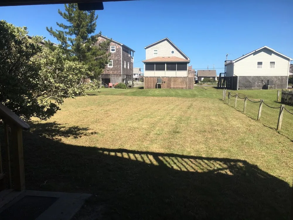 Custom landscape installation for beautiful yards in Kill Devil Hills, NC by Sonshine Landscaping Of Outer Banks