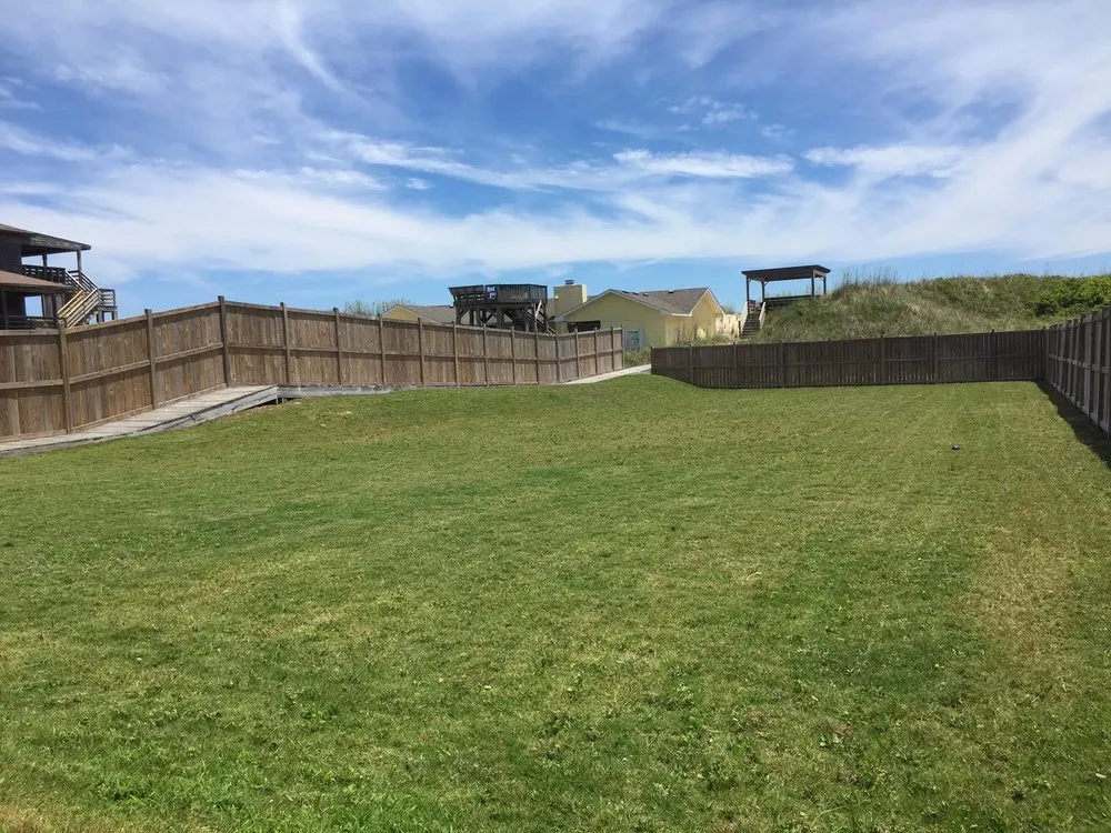 Top-rated lawn care service with custom design in Kill Devil Hills, NC by Sonshine Landscaping Of Outer Banks