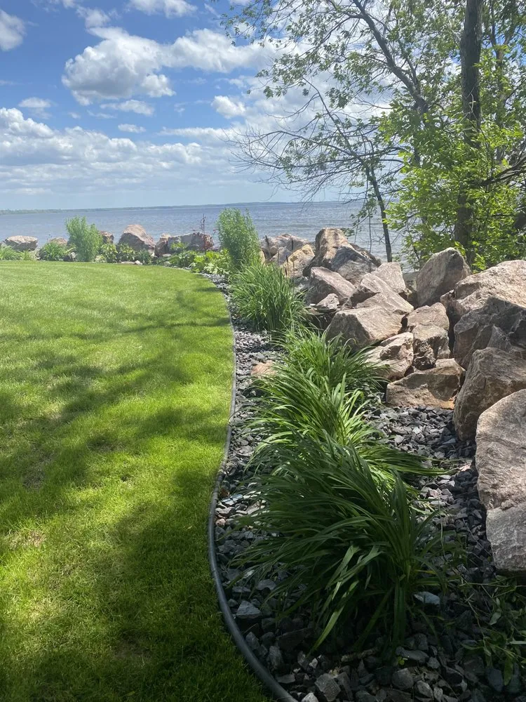 Trusted lawn mowing service for beautiful yards in Escanaba, MI by Soo Hill Lawn & Garden