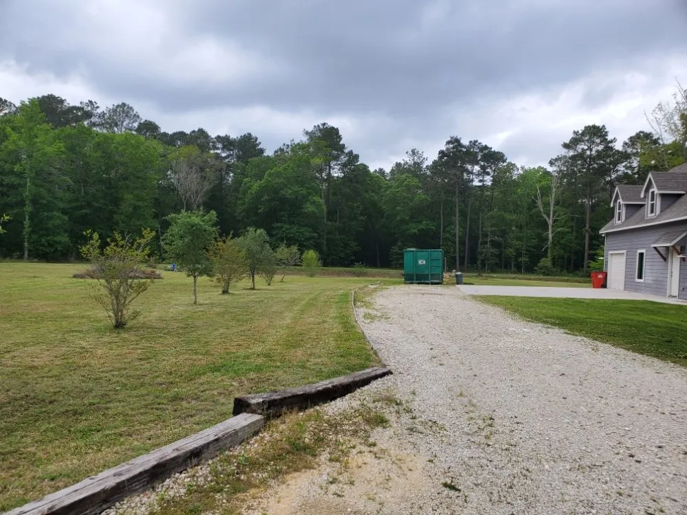 Affordable yard cleanup service in Crosby, TX by SOS Lawn Care & More