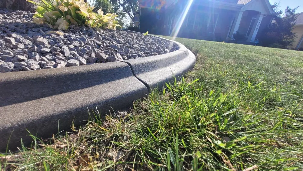 Custom lawn mowing service with custom design in Lakeville, MN by Sota Enterprises