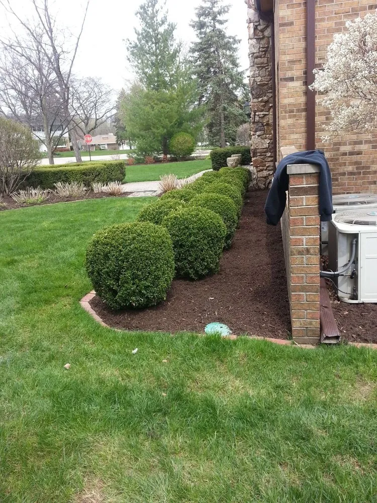Custom residential landscaping for year-round maintenance in Kenosha, WI by Soto Landscaping