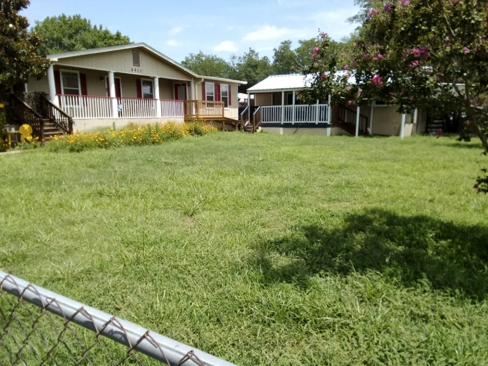 Affordable landscaping services for year-round maintenance in Floresville, TX by South Cross Pro Mowing Service