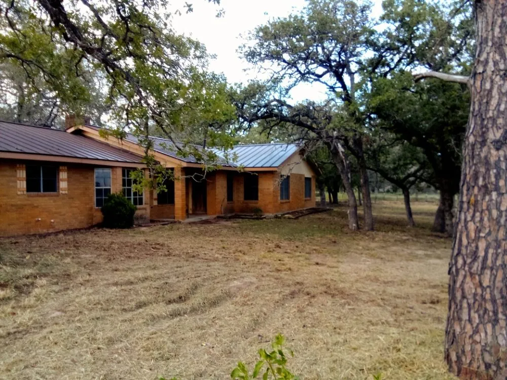 Custom garden landscaping in Floresville, TX by South Cross Pro Mowing Service