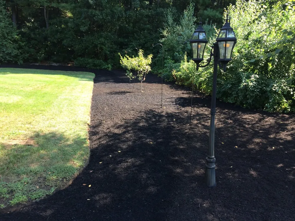 Professional landscape installation with custom design in Duxbury, MA by South East Property Managment