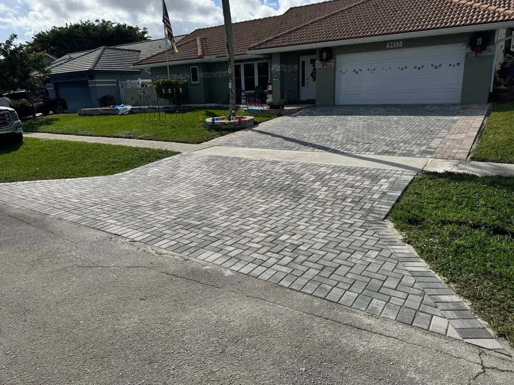 Trusted lawn mowing service for residential properties across Boca Raton, FL - South Florida Paver Pros