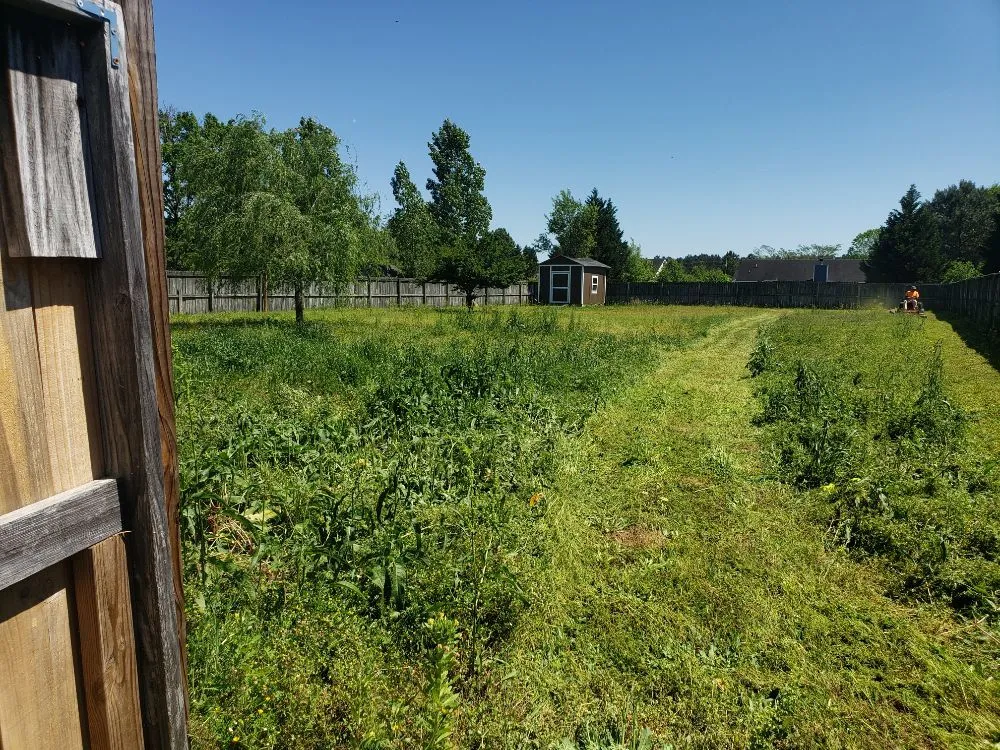 Professional landscape installation with custom design in Raeford, NC by South Montanez Lawn Care