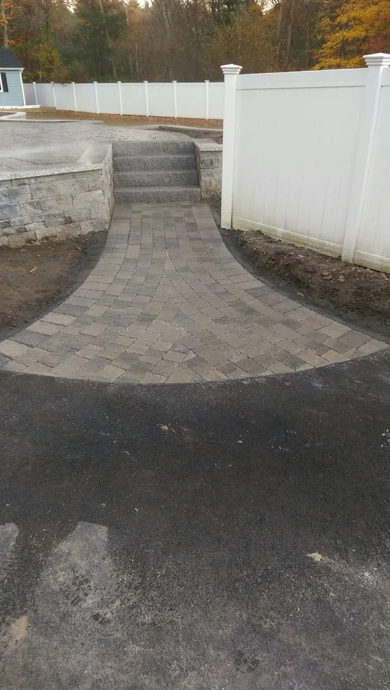 Custom lawn mowing service for residential properties across Pembroke, MA - South River Landscape