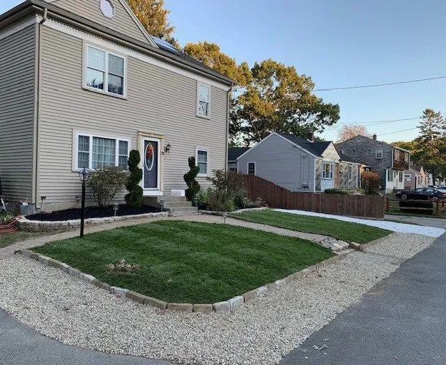 Professional lawn mowing service with custom design in Weymouth, MA by South Shore Landscaping Corp