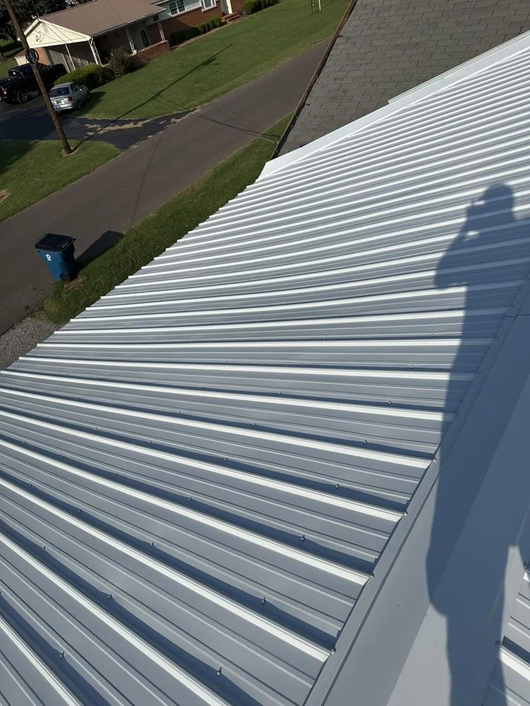 Affordable lawn mowing service in Union City, TN by Southerlands Roofing & Construction