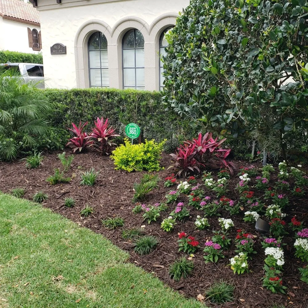 Local lawn mowing service with custom design in Windermere, FL by Southern Lakes Landscape