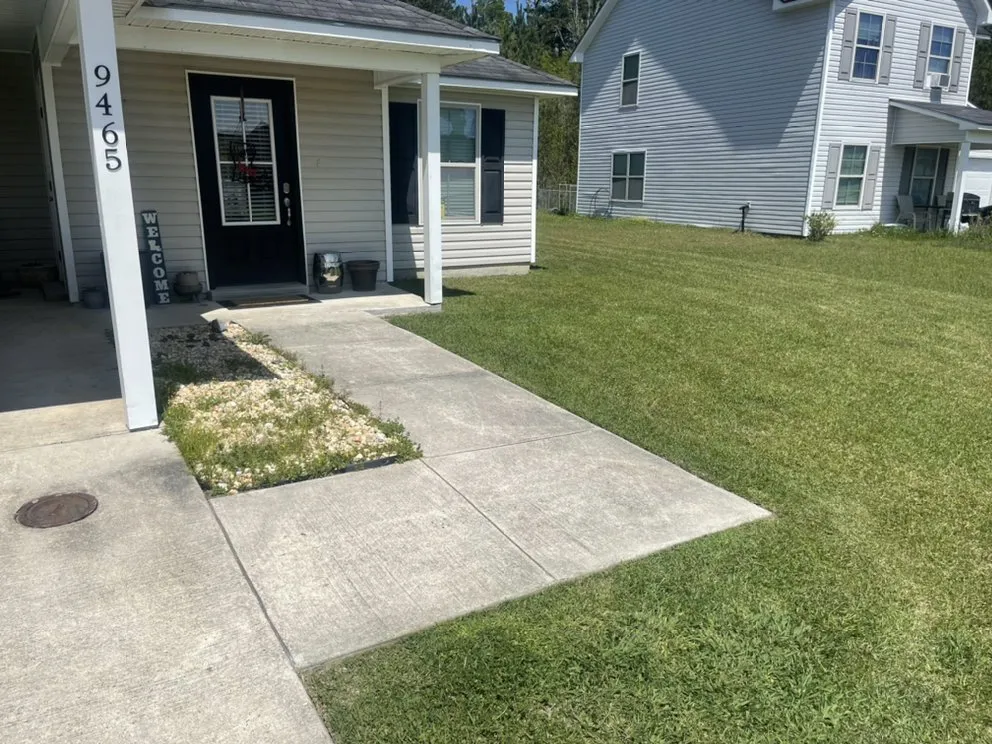 Professional yard cleanup service for residential properties in Walker, LA by Southern Lawn Company and Pressure Washing