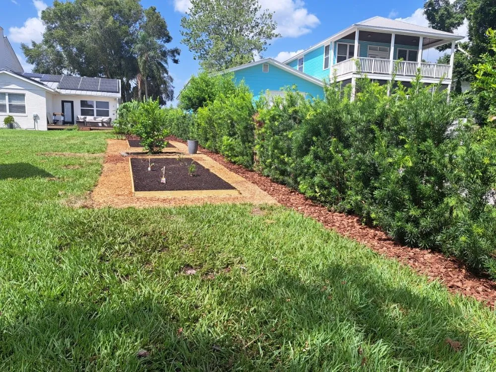 Custom landscape installation with custom design in Lake Placid, FL by Southern Paradise Landscaping