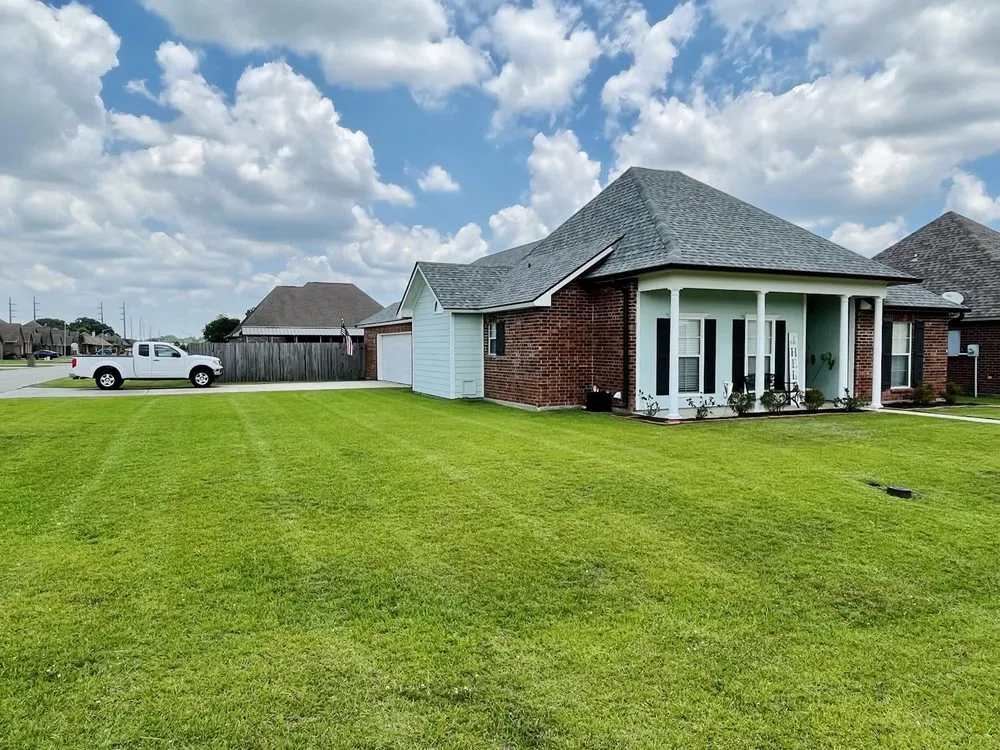 Custom lawn mowing service in Youngsville, LA by Southern Roots Lawn Maintenance