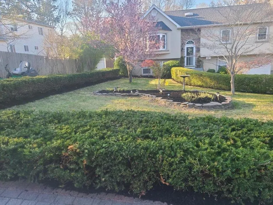 Local lawn mowing service for year-round maintenance across Coram, NY - Southern Touch Excavation & Landscapes