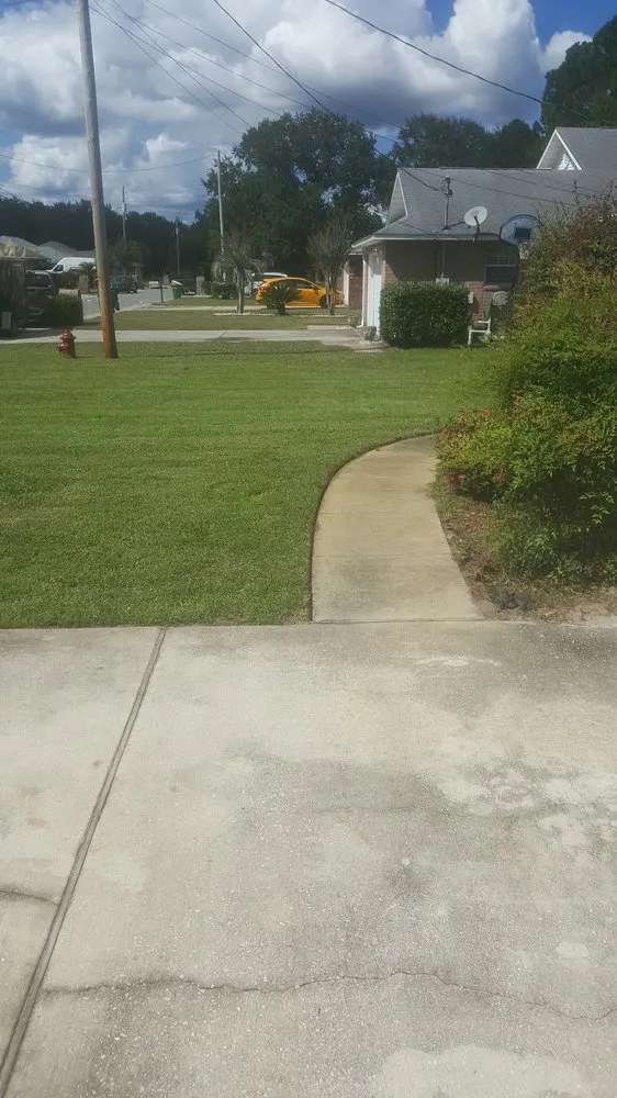 Top-rated lawn mowing service near you in Gulf Breeze, FL by Sowing Seeds Lawn Service