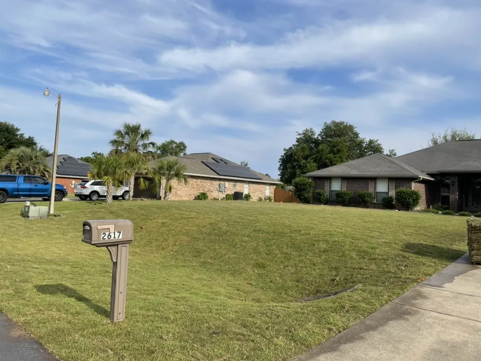 Affordable yard maintenance for residential properties in Navarre, FL by Sp lawn care and landscaping