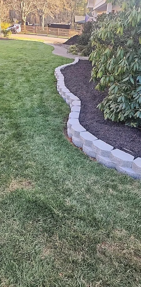 Professional lawn care service for homes in Hendersonville, NC by Sp Property Services