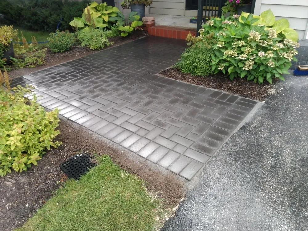 Reliable lawn mowing service for homes in Wauwatosa, WI by Spahn Manning Landscape