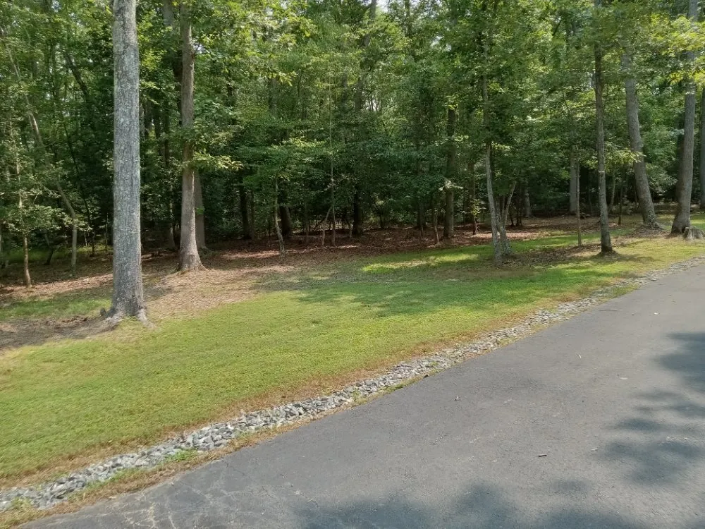 Custom garden landscaping in Burgess, VA by Sparkplug's Lawn Care & Home Repairs