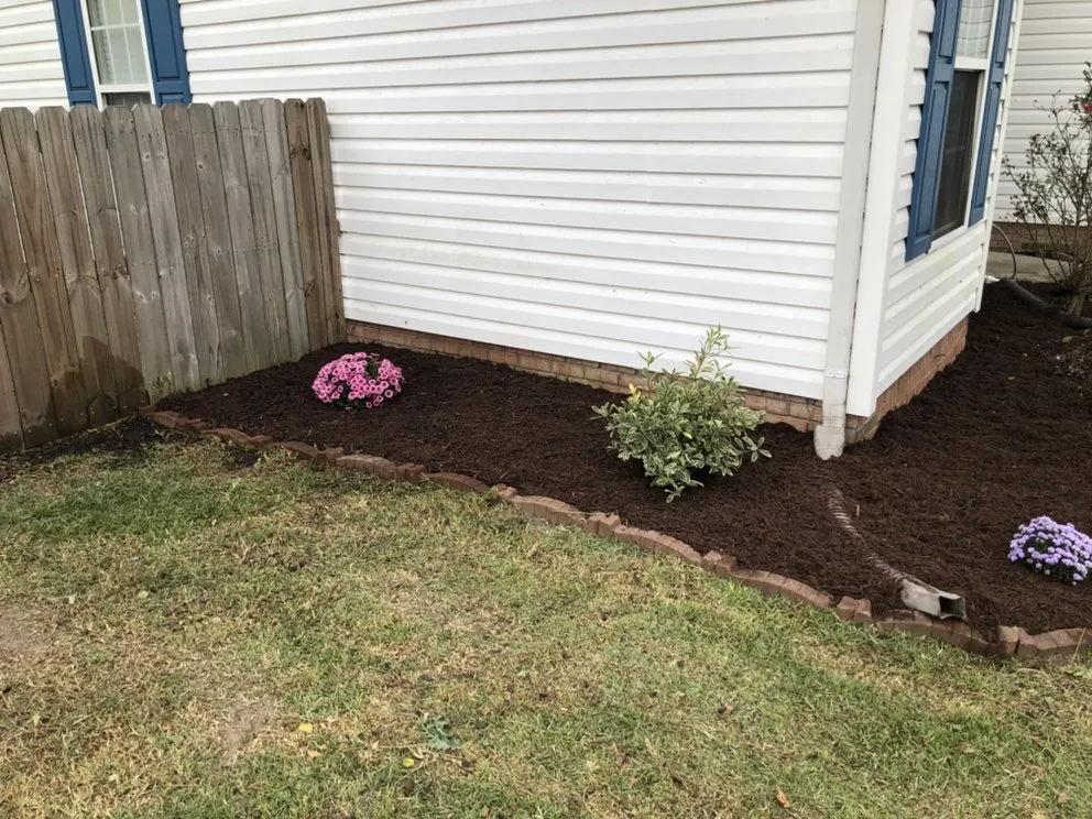 Custom lawn mowing service for homes in Jacksonville, NC by Sparky’s Lawn & Property Maintenance