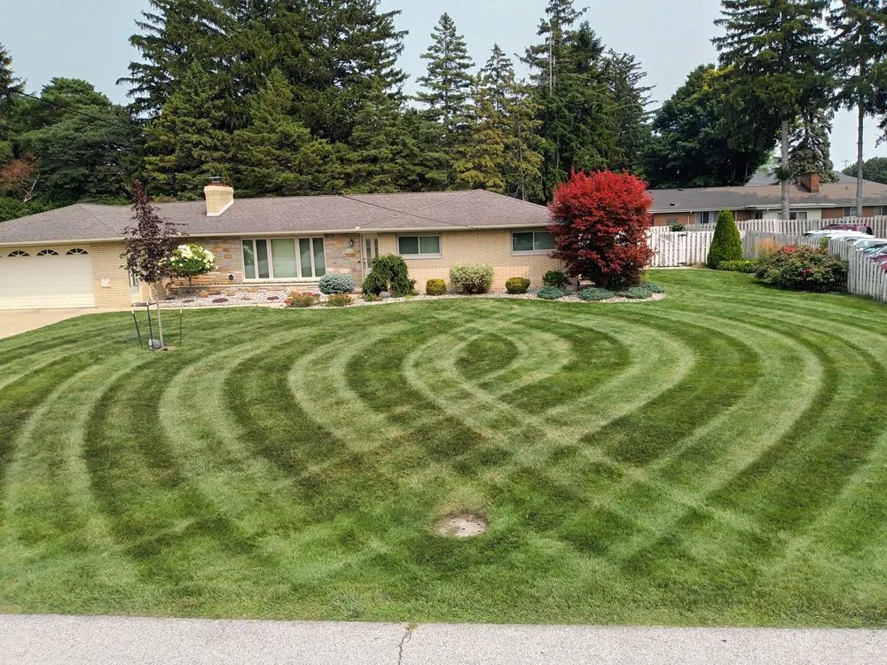 Trusted lawn mowing service with custom design in Hasbrouck Heights, NJ by Spartan Landscaping