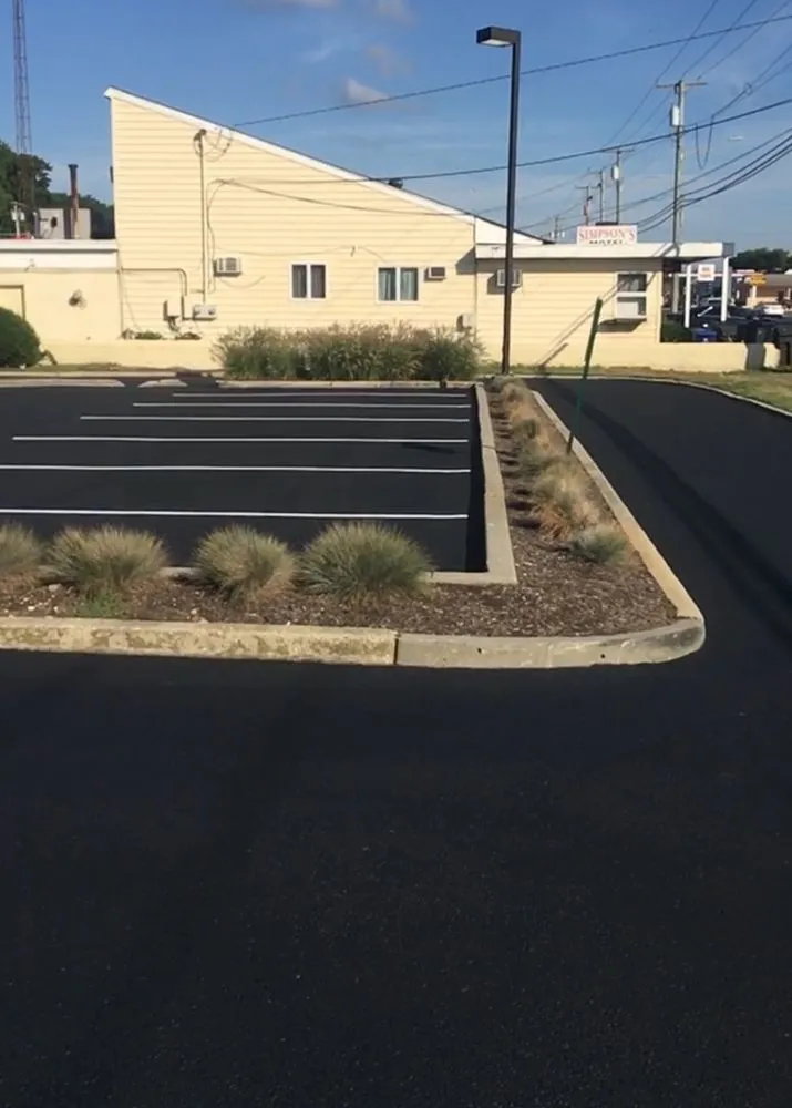 Custom outdoor landscaping in Millville, NJ by Spartan Sealcoating & Property Maintenance