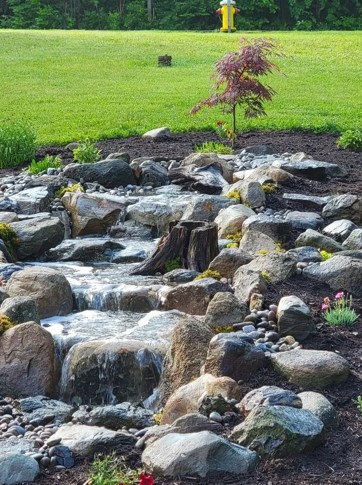 Custom landscape design in Cobleskill, NY by Spaulding Water Gardens and Lawn Care
