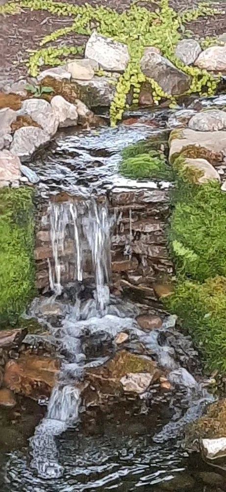 Local outdoor landscaping with custom design in Cobleskill, NY by Spaulding Water Gardens and Lawn Care