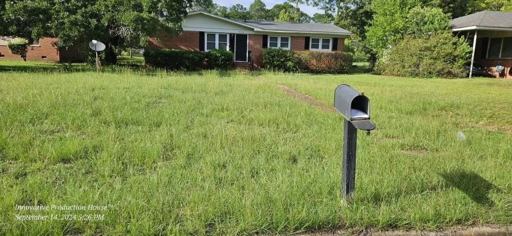 Custom lawn care service for homes in Warwick, GA by Spears Outdoor Services