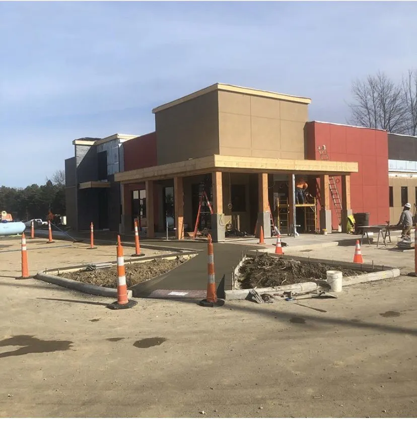 Professional lawn mowing service for year-round maintenance across Chesterland, OH - Specialized Concrete